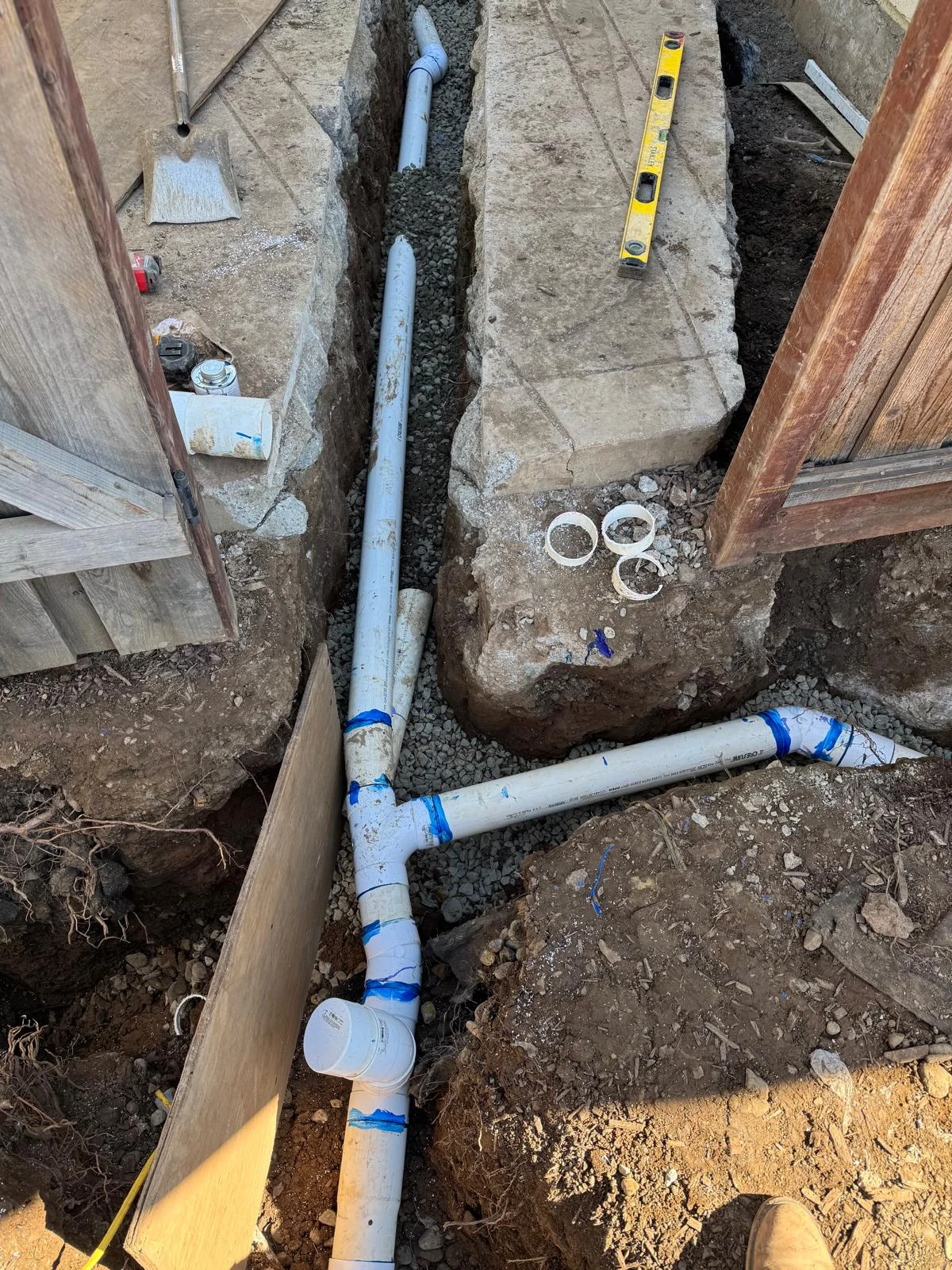 Drain piping installed in an excavated trench